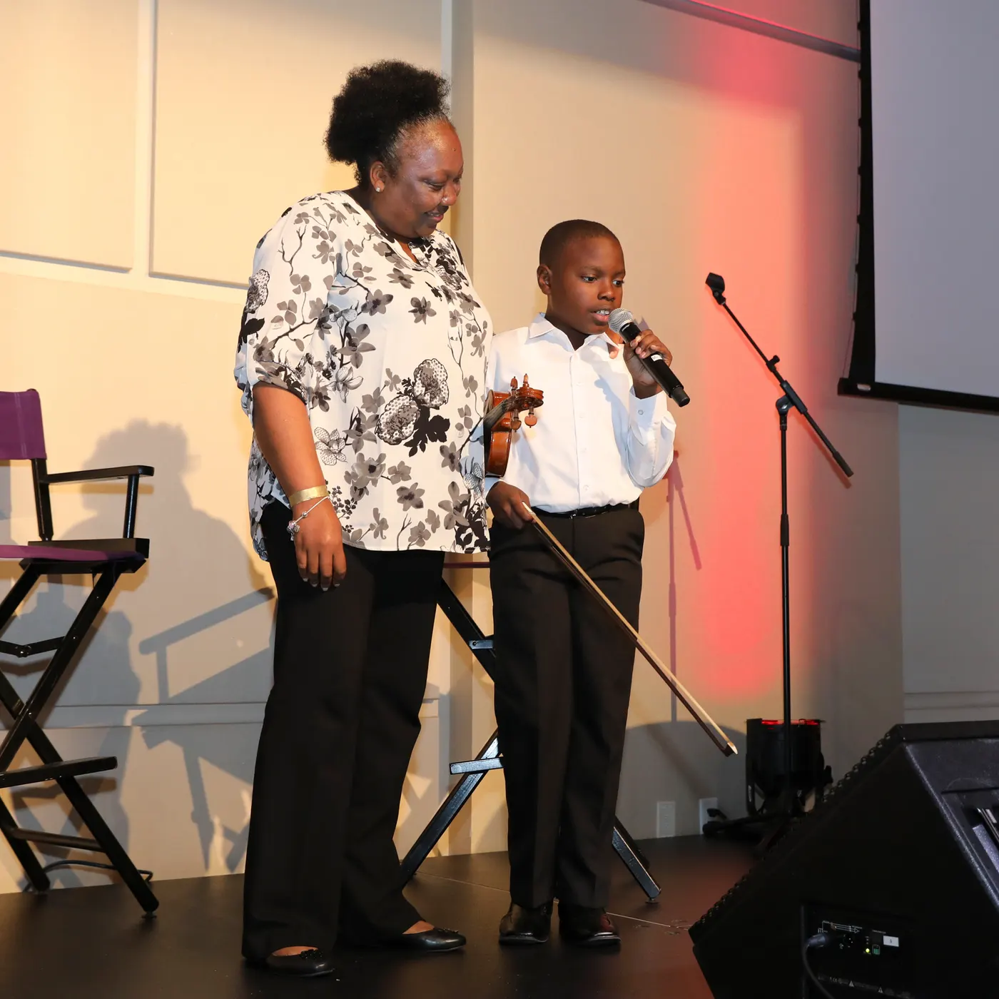 Dream event; Principal Latosha Williams of Bethune Elementary with an orchestra student.-Photo by David I Muirserves as the Foundation’s pre